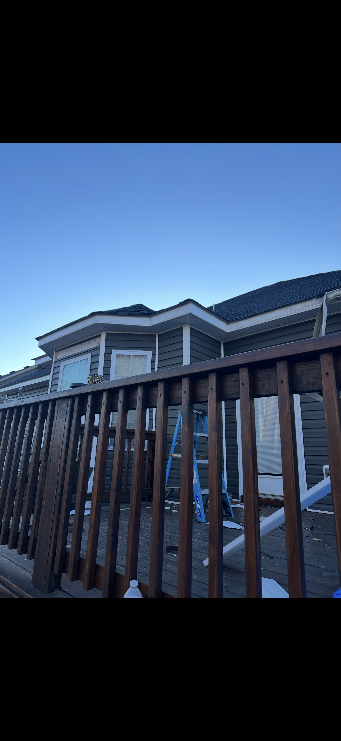 Close-up of completed roofline and gutters