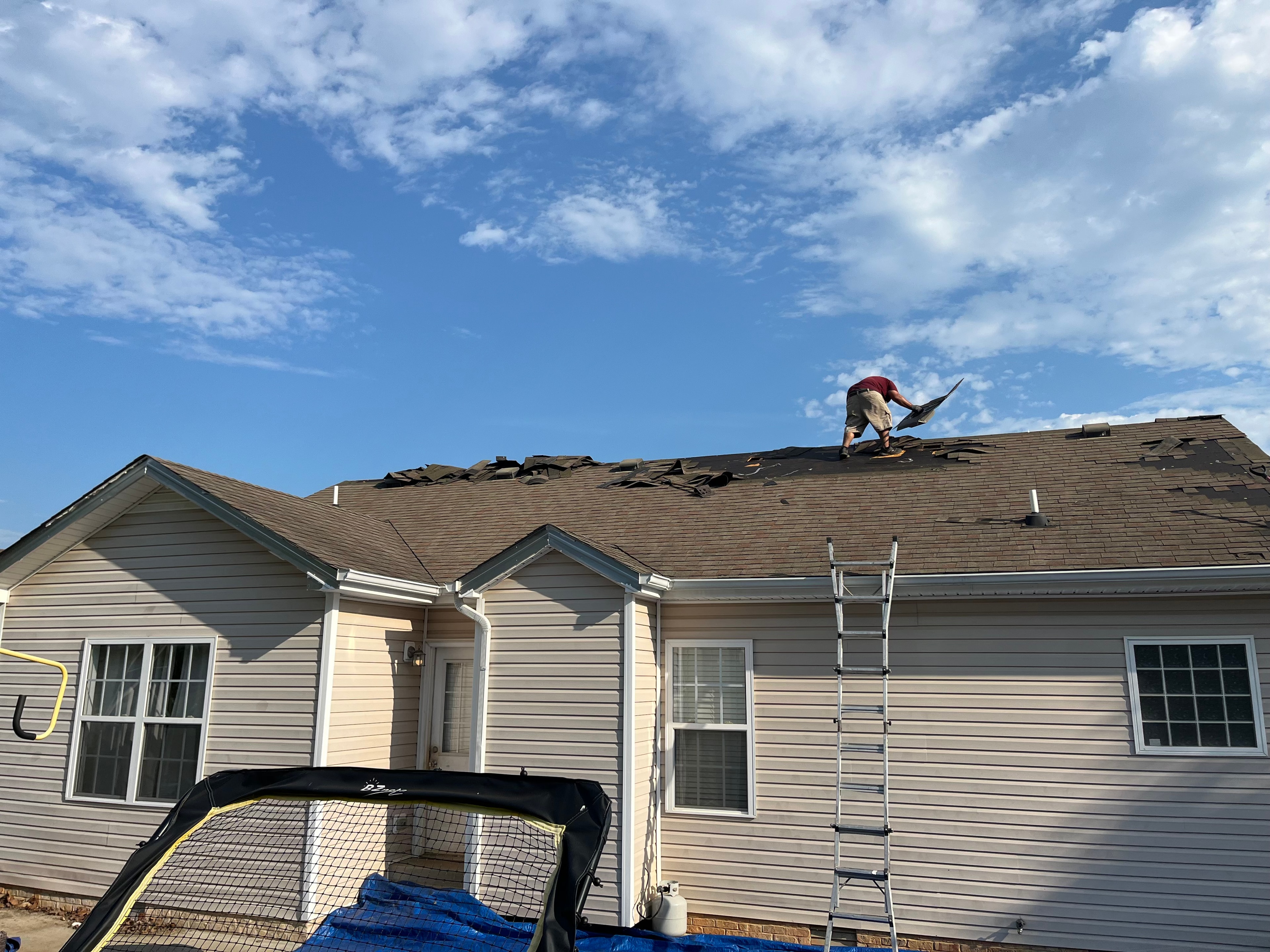 Roofing workers on roof