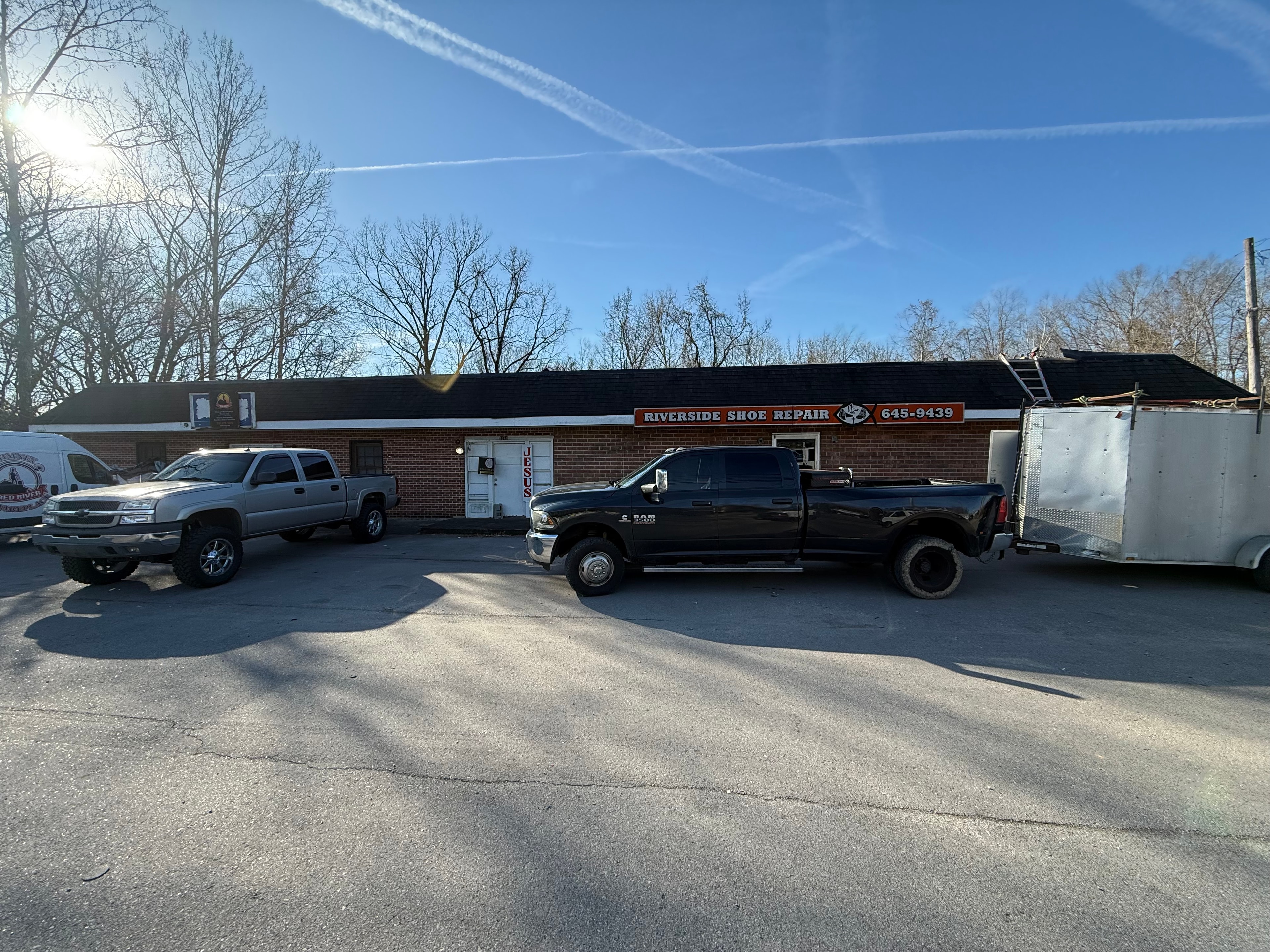 Completed commercial flat roof on brick strip mall building